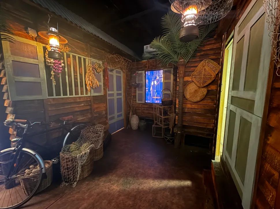 Rustic timber room with a bicycle and a screen