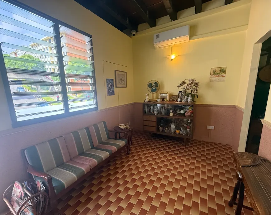 Room with patterned floor tiles and benches