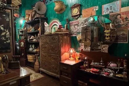 Vintage room filled with antique furniture and decor