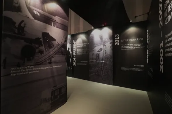 Dark timeline wall about riots in Singapore history