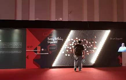 Visitor at the Happy Birthday Singapore light wall