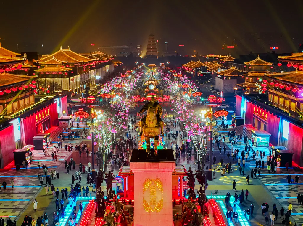 Datang Everbright City in Xi'an at night, lined with lit Tang-style halls
