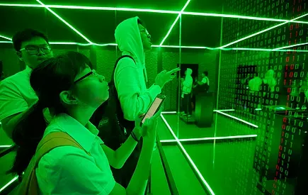 Students inside a green laser escape room